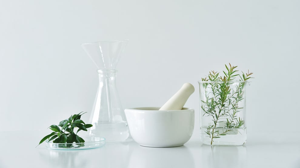 Natural Apothecary Concept and Laboratory Equipment on White Background